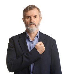 Mature man making promise on white background. Oath gesture