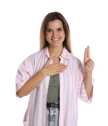 Photo of Woman showing oath gesture on white background. Making promise