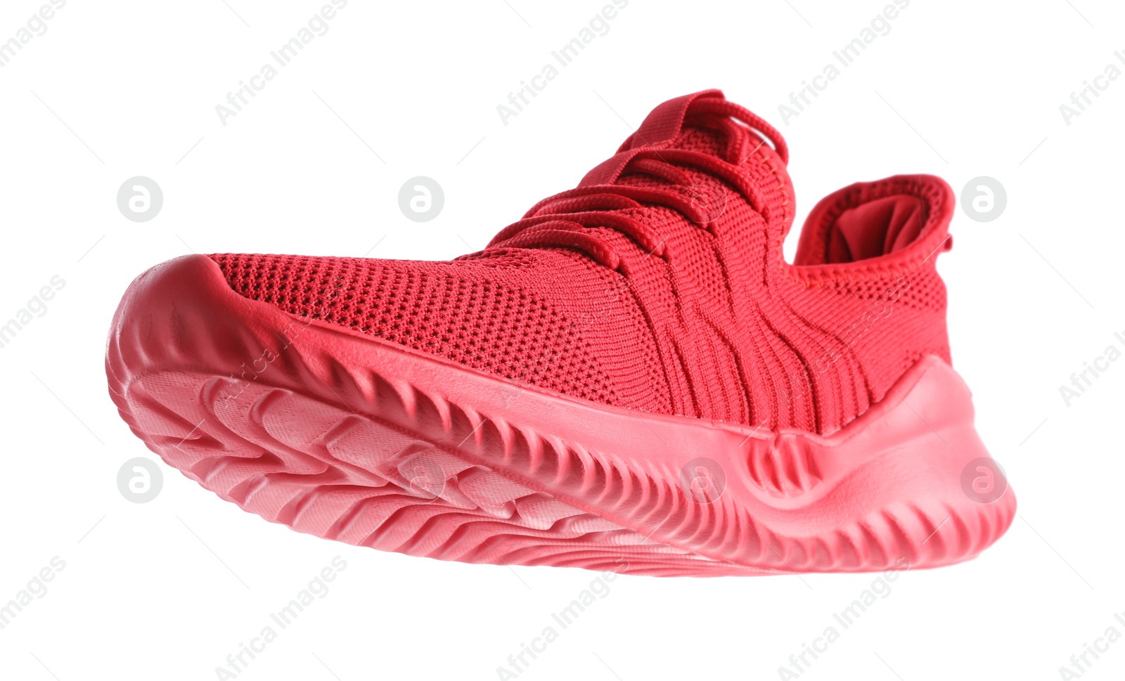 Photo of One stylish red sneaker isolated on white