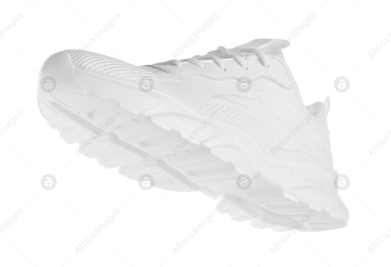 Photo of One stylish sneaker isolated on white. Comfortable footwear