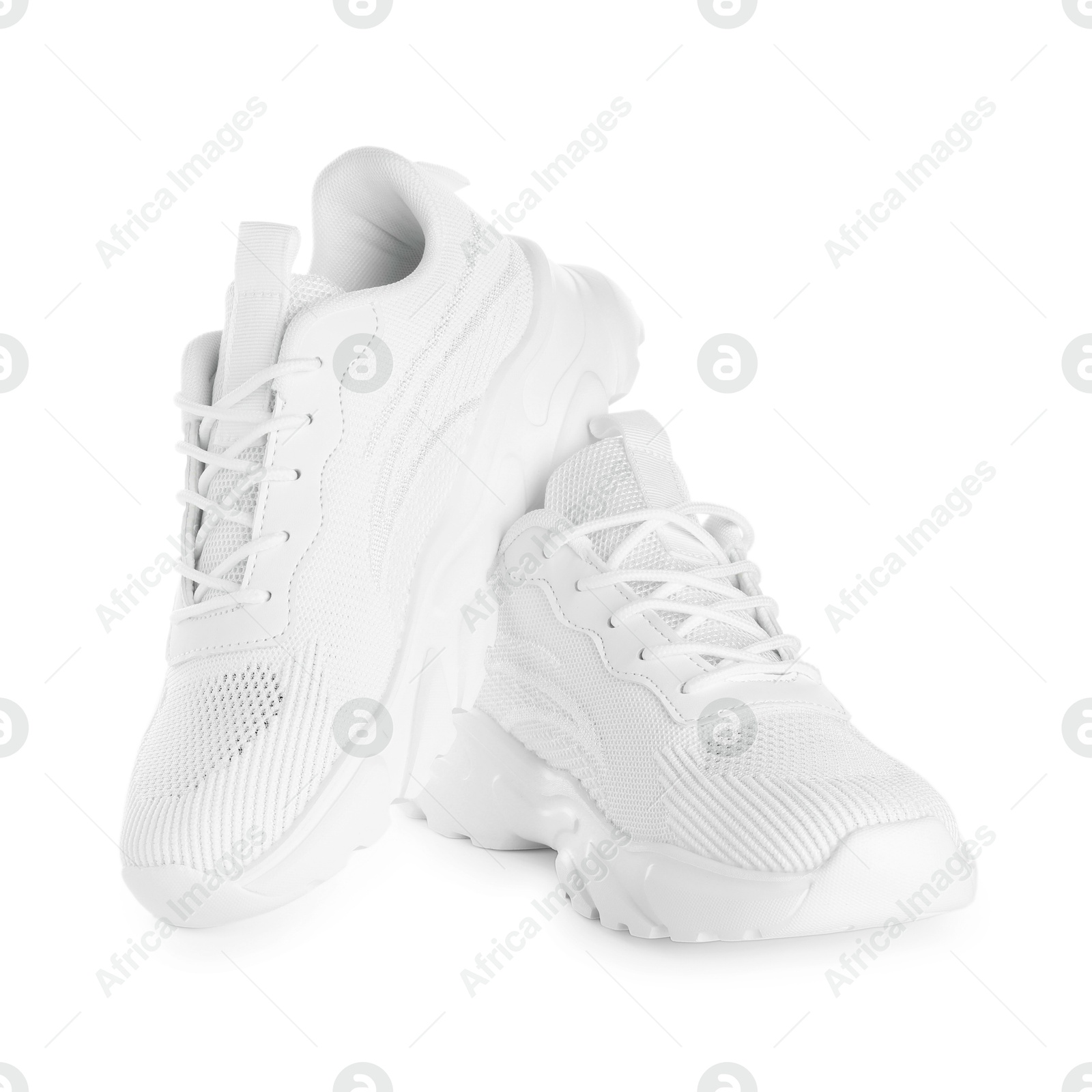 Photo of Pair of stylish sneakers isolated on white