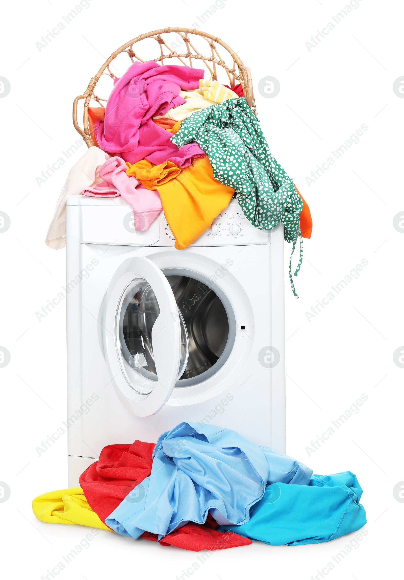 Photo of Washing machine and laundry basket with colorful clothes isolated on white