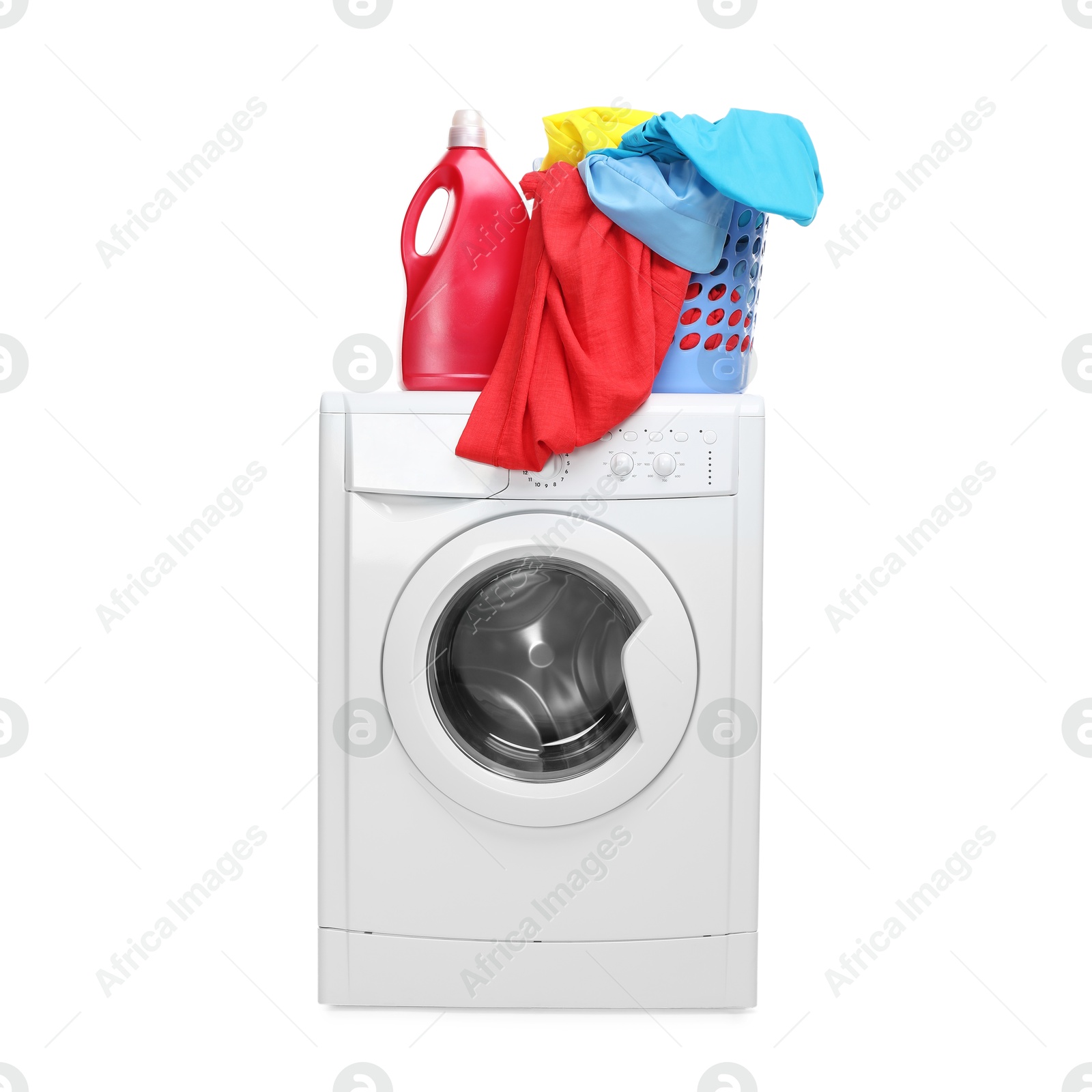 Photo of Washing machine, detergent and laundry basket with colorful clothes isolated on white