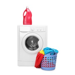 Photo of Washing machine, detergent and laundry basket with colorful clothes isolated on white