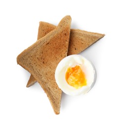 Photo of Soft boiled egg in eggcup with bread isolated on white, top view