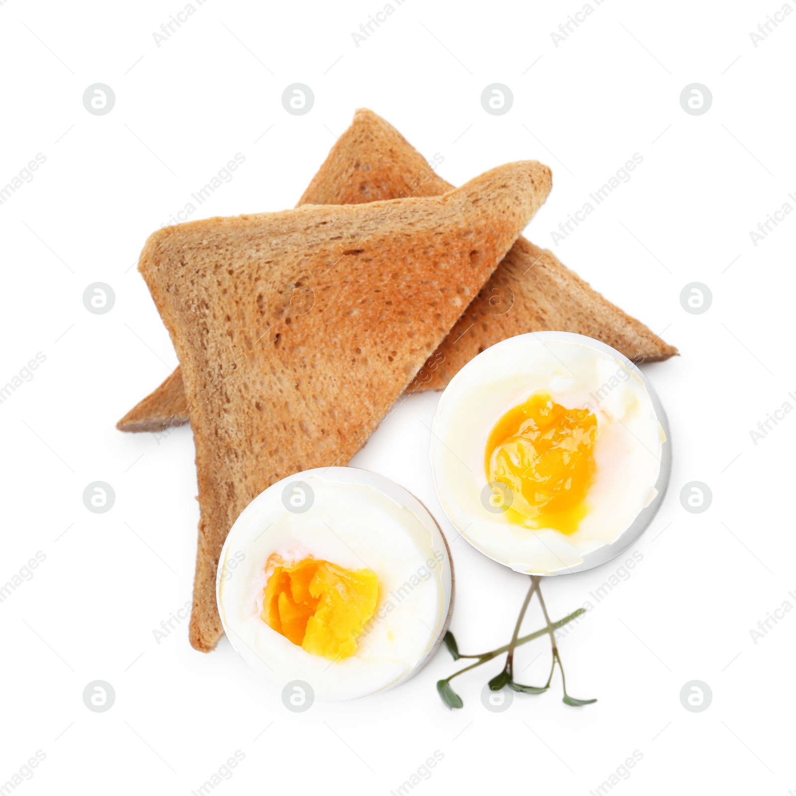 Photo of Soft boiled eggs and bread isolated on white, top view