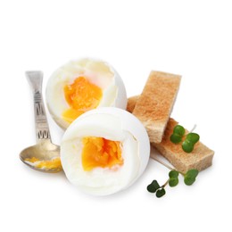 Photo of Soft boiled eggs, bread and spoon isolated on white