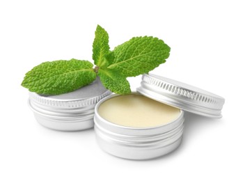 Photo of Mint lip balms and green leaves isolated on white. Cosmetic product