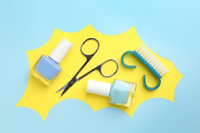 Photo of Set of pedicure tools on color background, flat lay