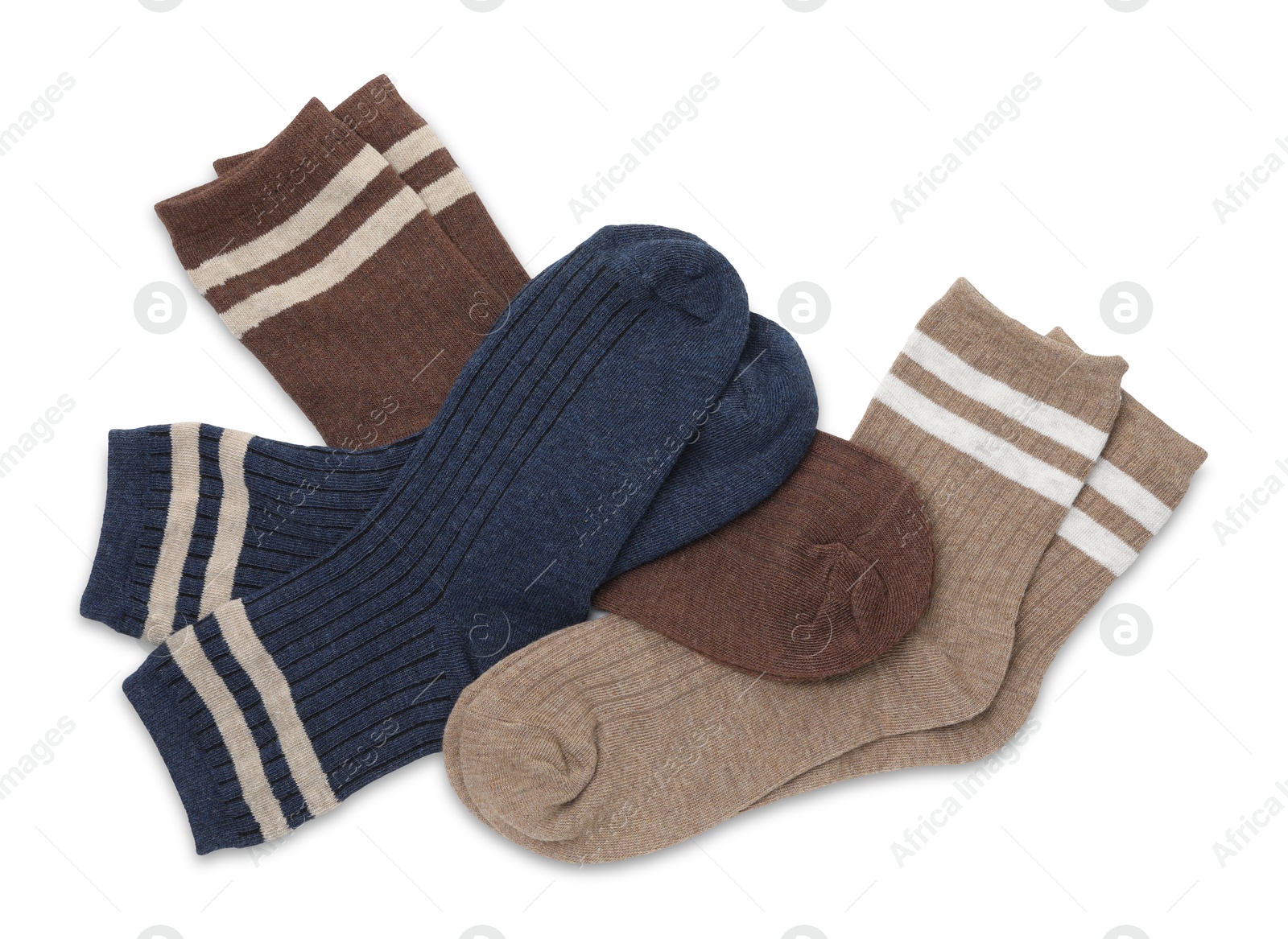 Photo of Different soft socks isolated on white, top view