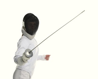 Photo of Fencer with epee practicing on white background