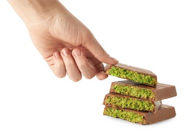 Photo of Woman with pieces of Dubai chocolate on white background, closeup