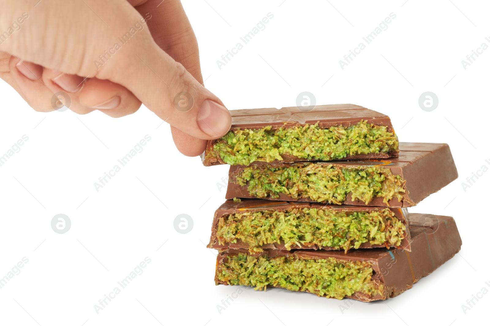 Photo of Woman with pieces of Dubai chocolate on white background, closeup