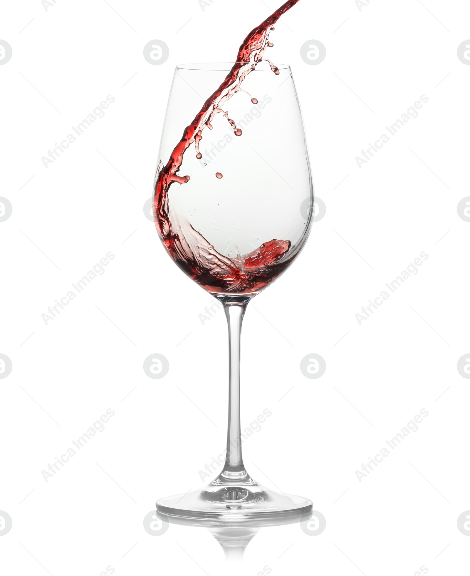 Photo of Tasty wine splashing in glass on white background