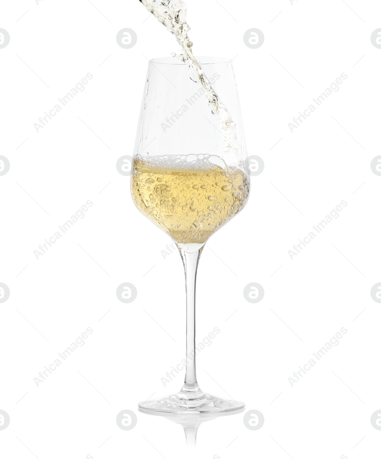 Photo of Tasty wine splashing in glass on white background