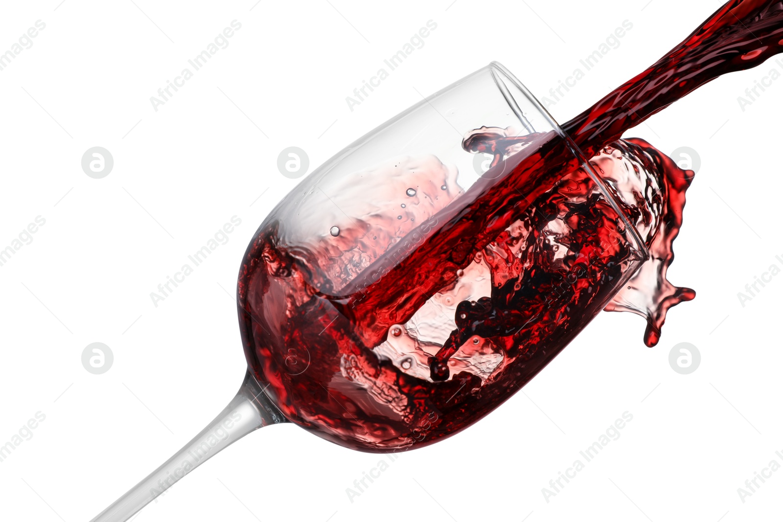 Photo of Pouring wine into glass on white background