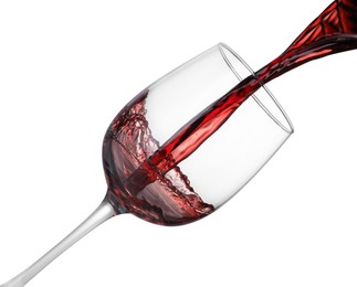 Photo of Pouring wine into glass on white background