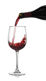 Photo of Pouring wine into glass on white background