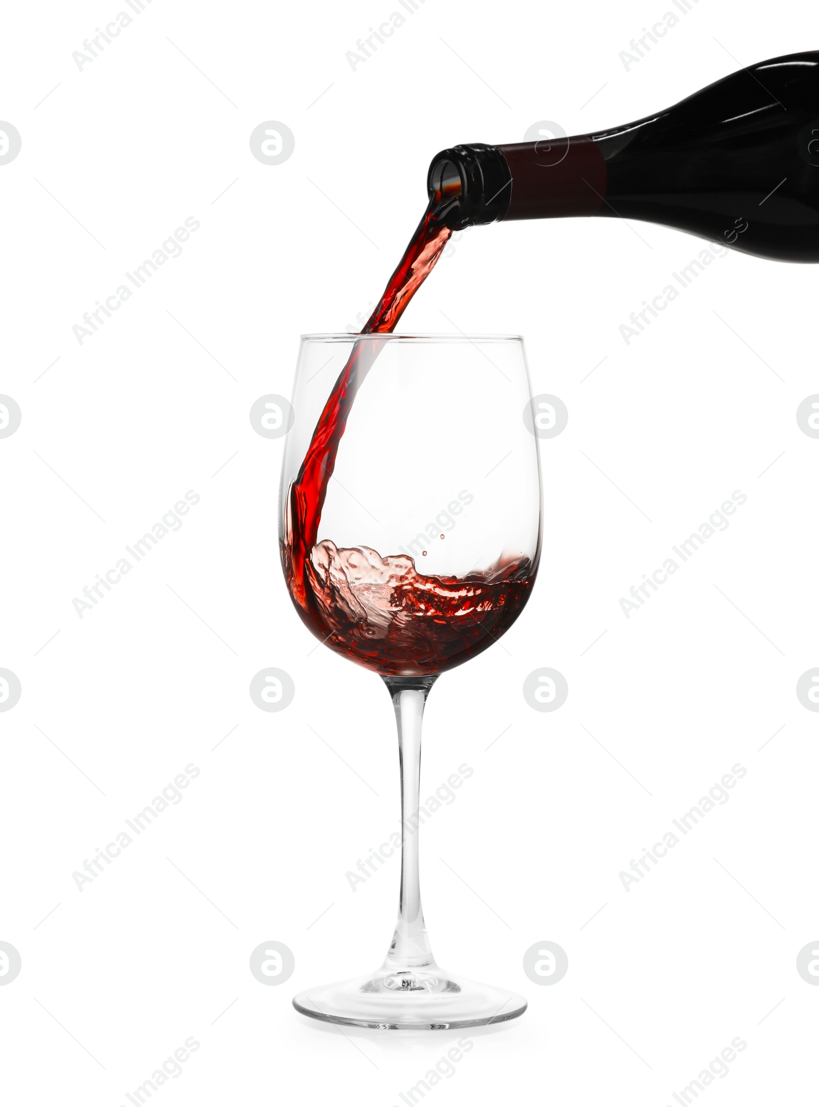 Photo of Pouring wine into glass on white background