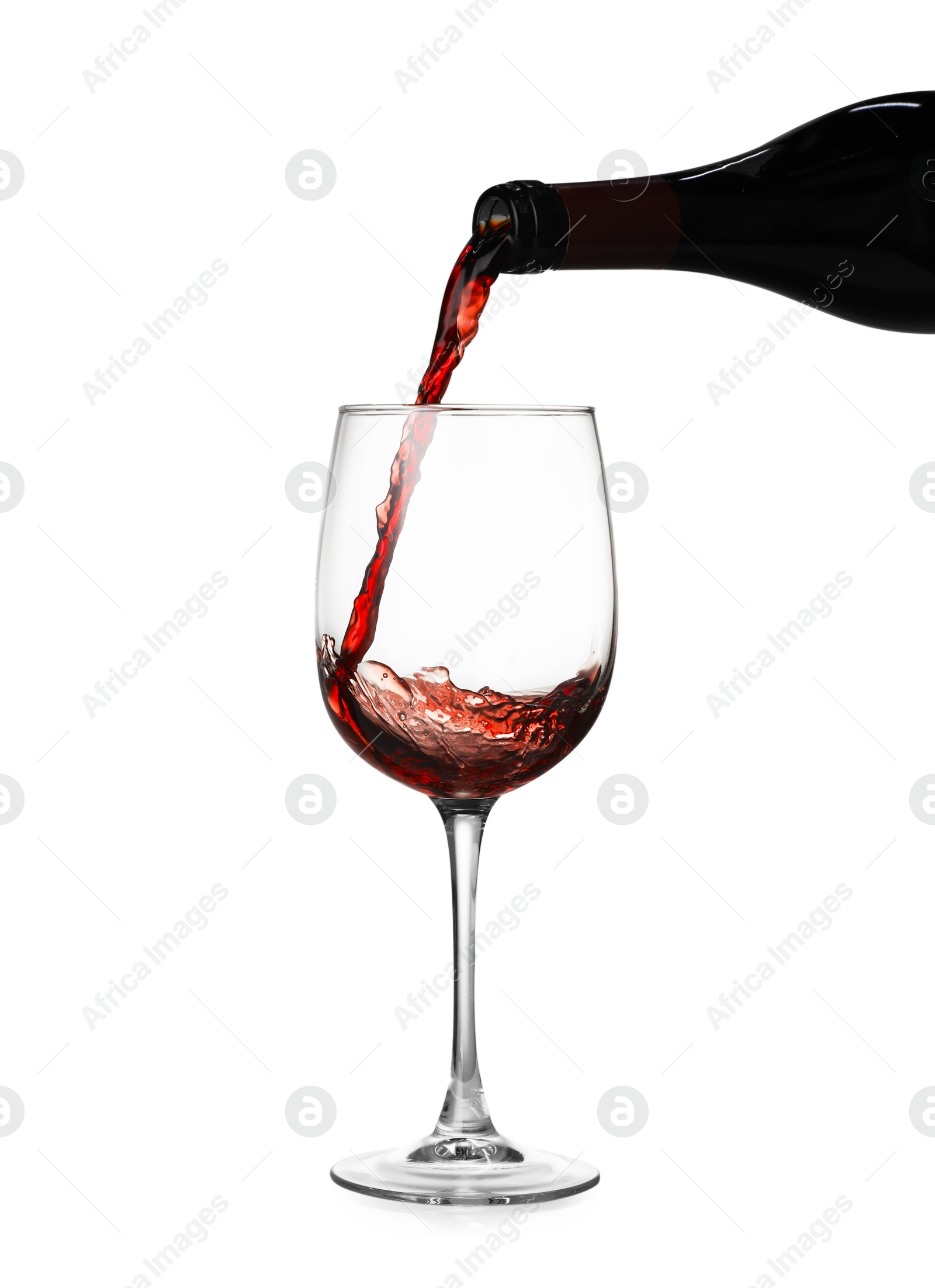 Photo of Pouring wine into glass on white background