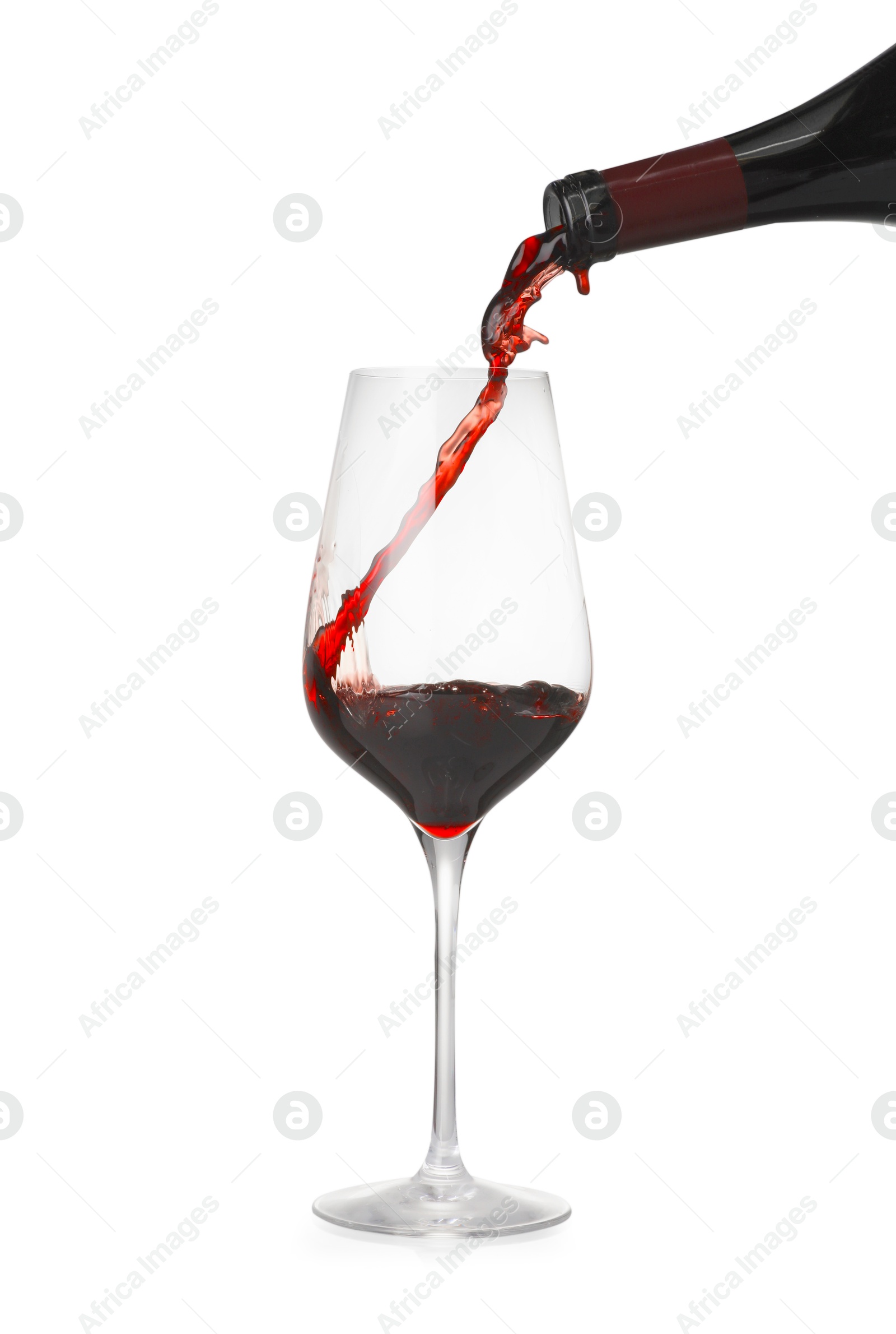 Photo of Pouring wine into glass on white background