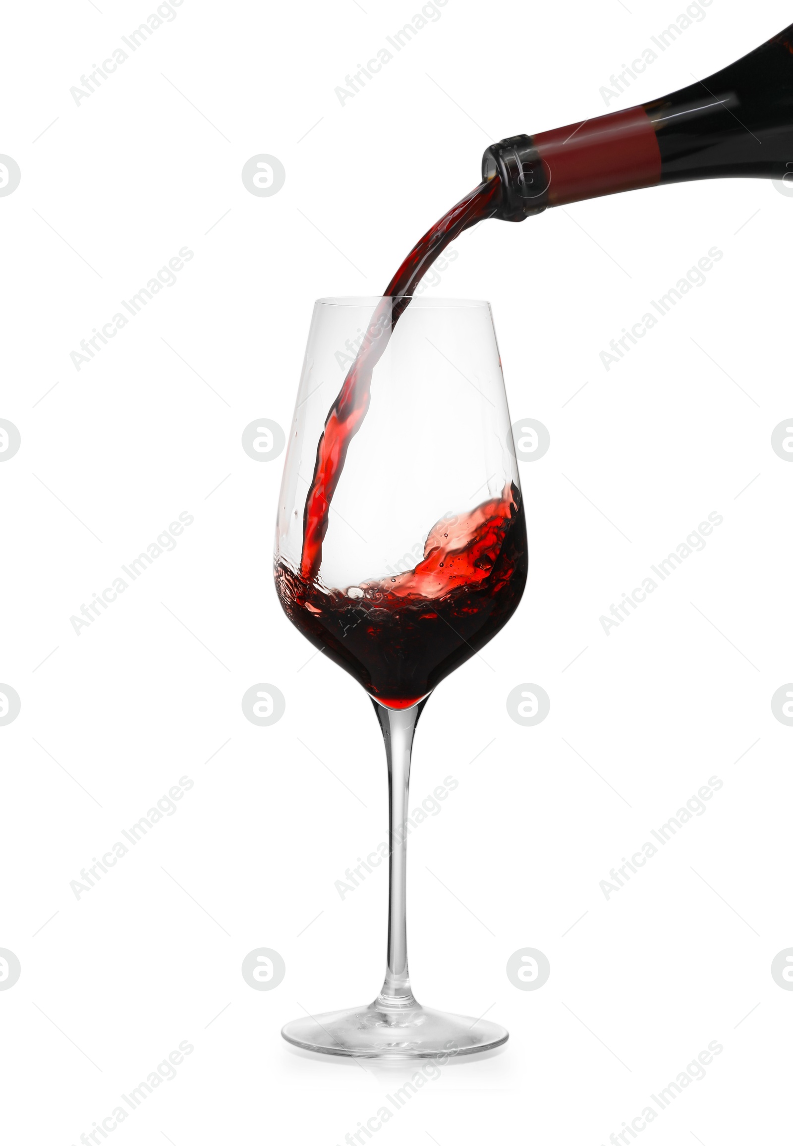 Photo of Pouring wine into glass on white background