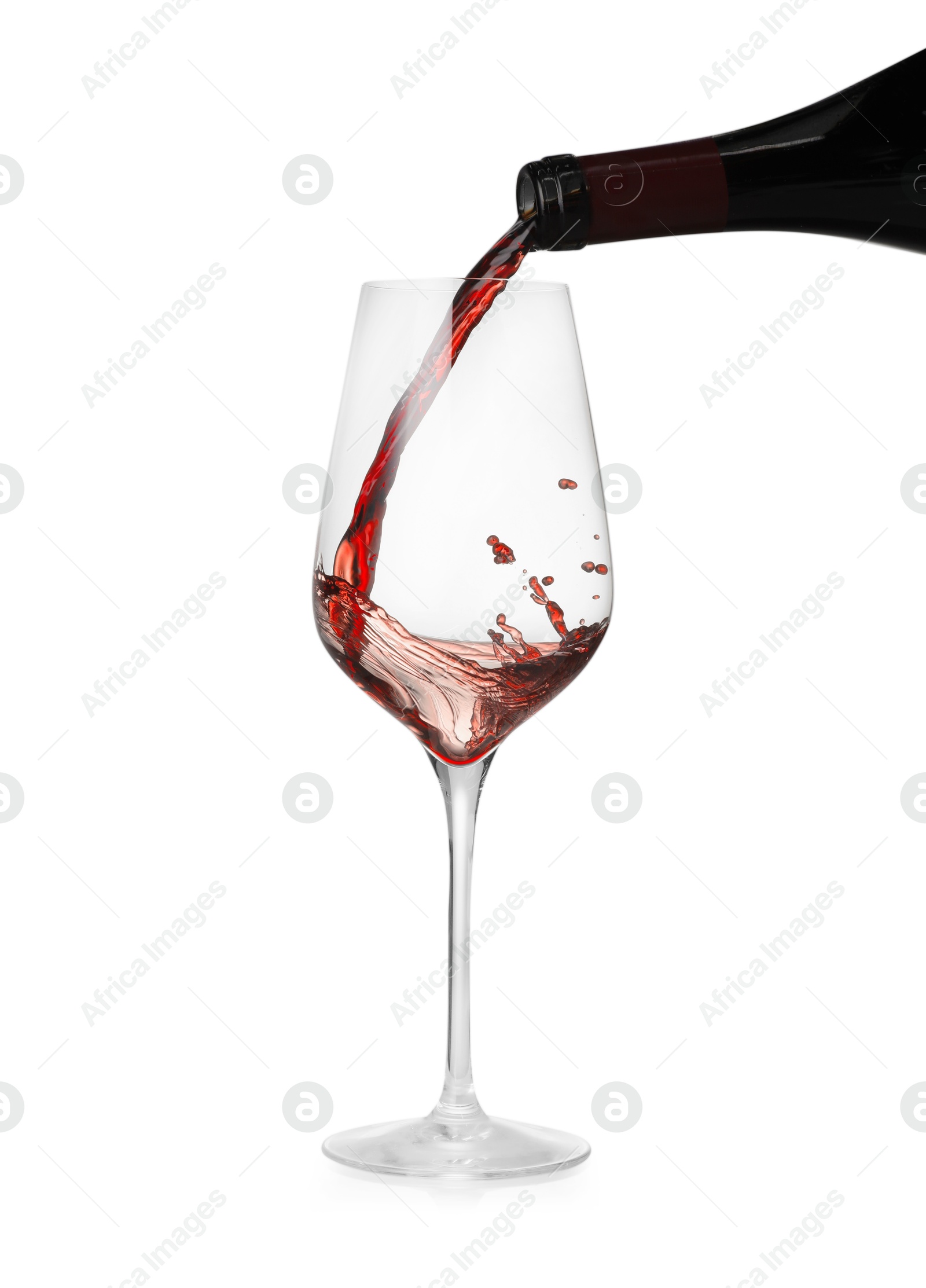 Photo of Pouring wine into glass on white background