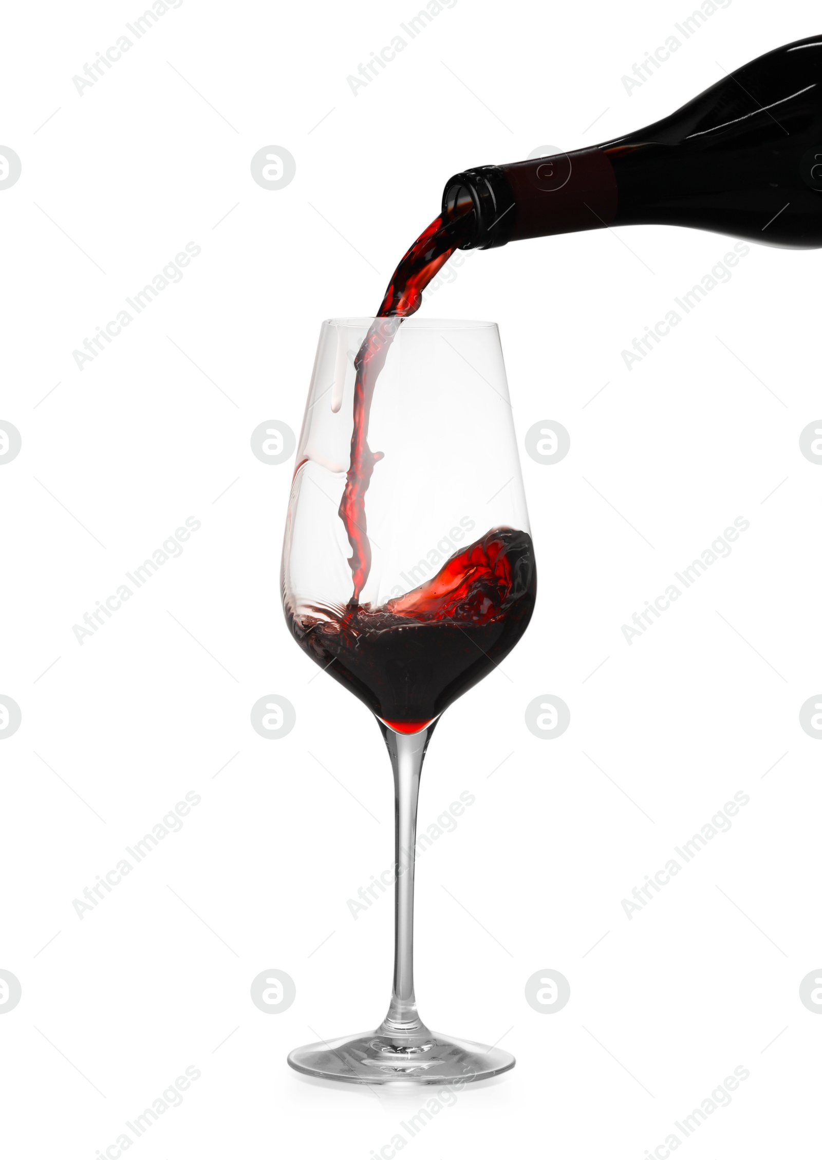 Photo of Pouring wine into glass on white background