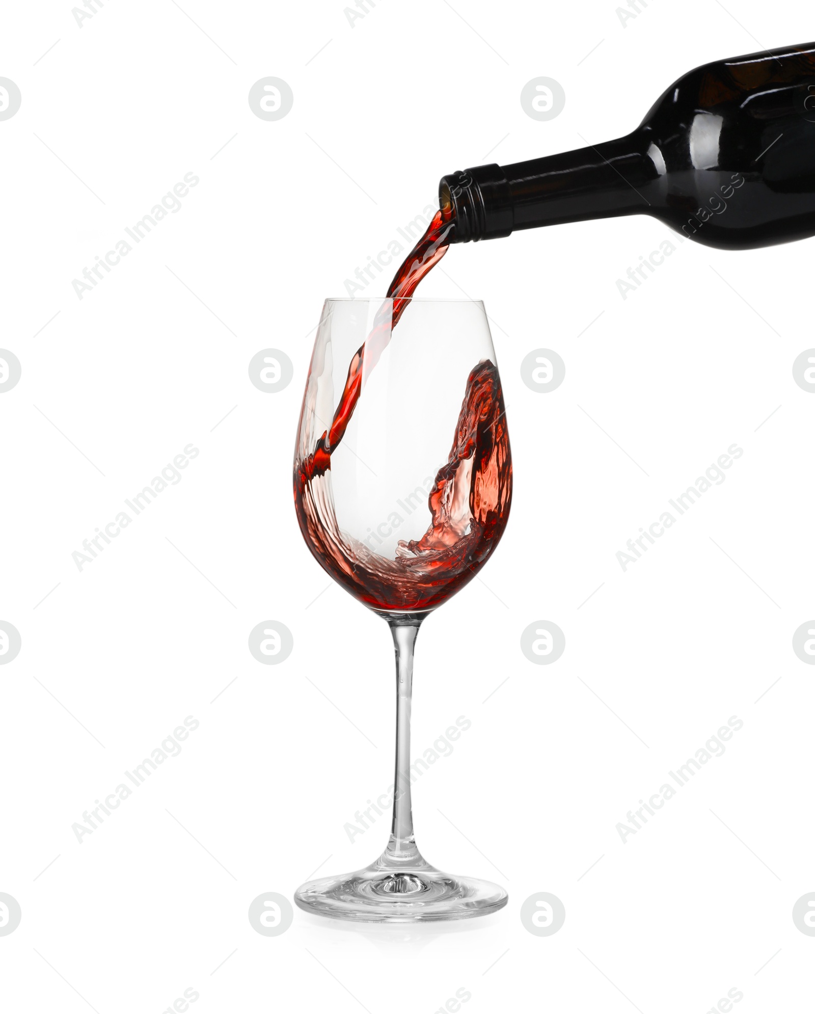 Photo of Pouring wine into glass on white background