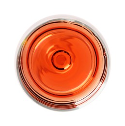 Photo of Rose wine in glass isolated on white, top view