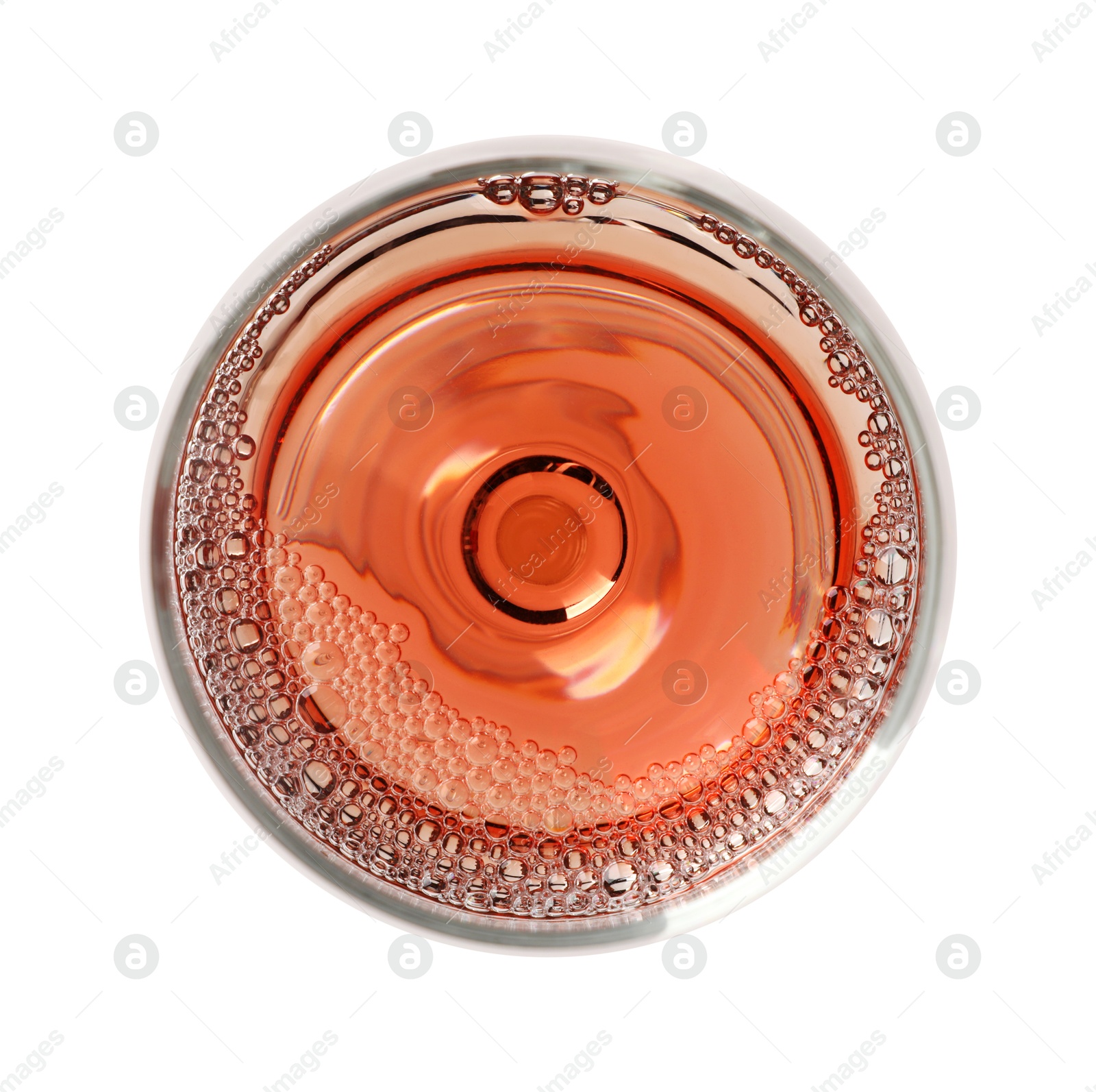 Photo of Rose wine in glass isolated on white, top view