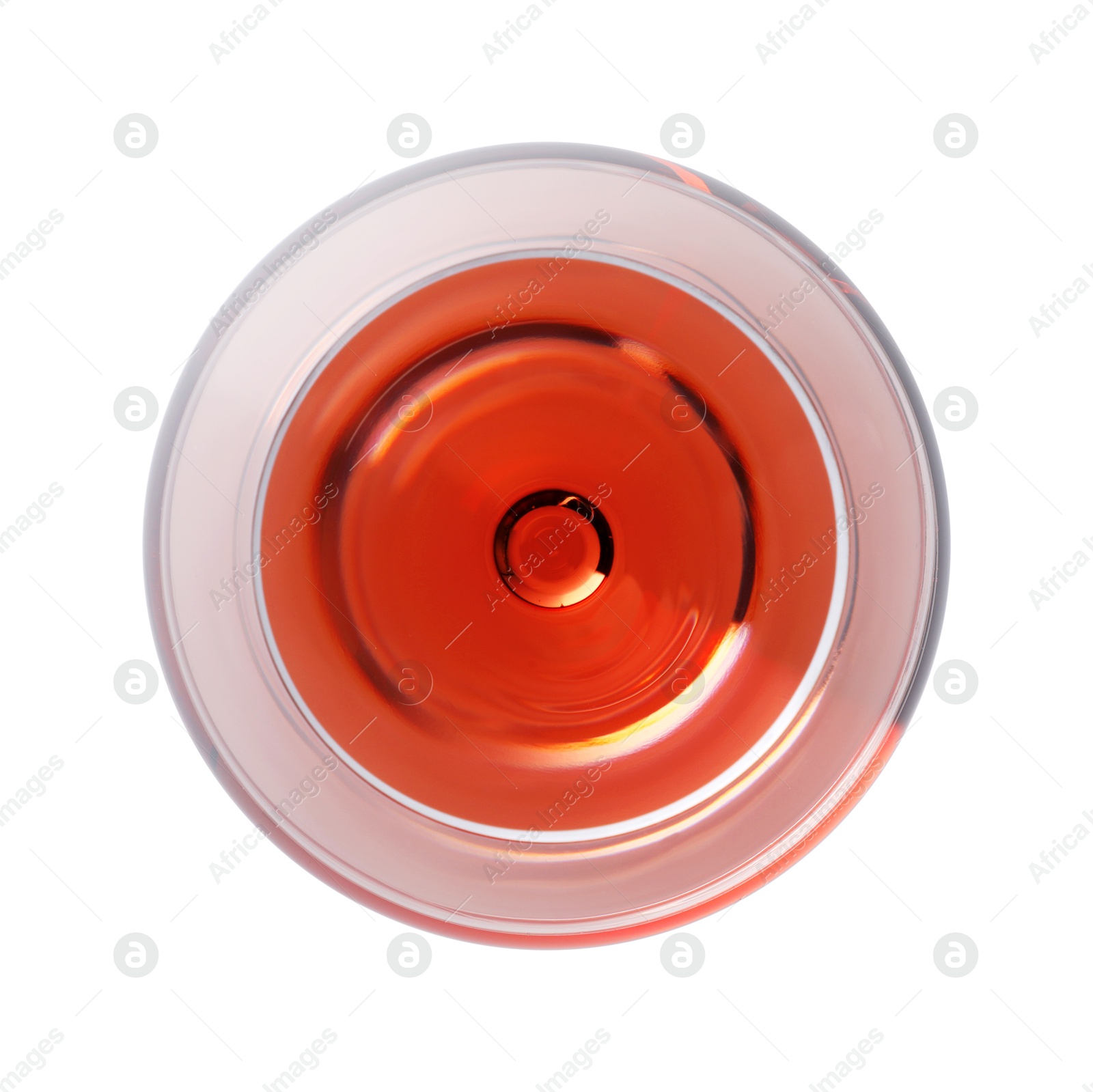 Photo of Rose wine in glass isolated on white, top view