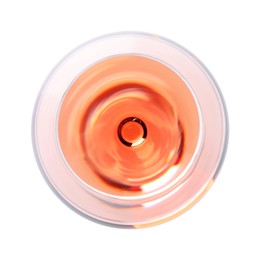 Photo of Rose wine in glass isolated on white, top view