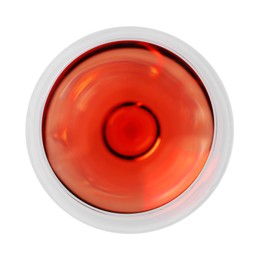 Photo of Rose wine in glass isolated on white, top view