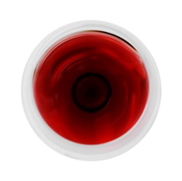 Photo of Red wine in glass isolated on white, top view