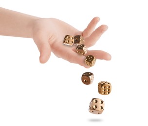 Image of Woman throwing gold dice on white background, closeup