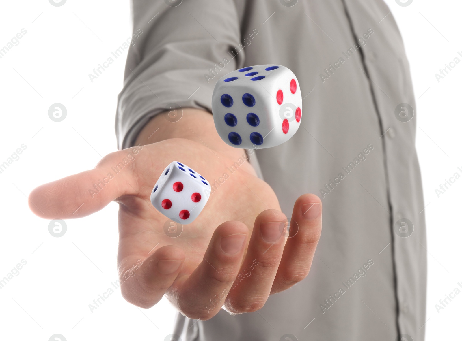 Image of Man throwing dice on white background, closeup