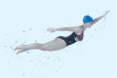 Woman wearing swimsuit swimming in water. Aquatic sport