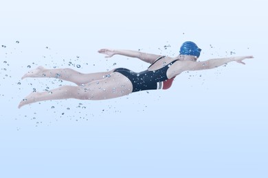 Image of Woman wearing swimsuit swimming in water. Aquatic sport