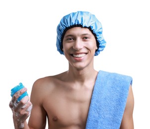 Photo of Happy man in shower cap with towel and mesh sponge on white background