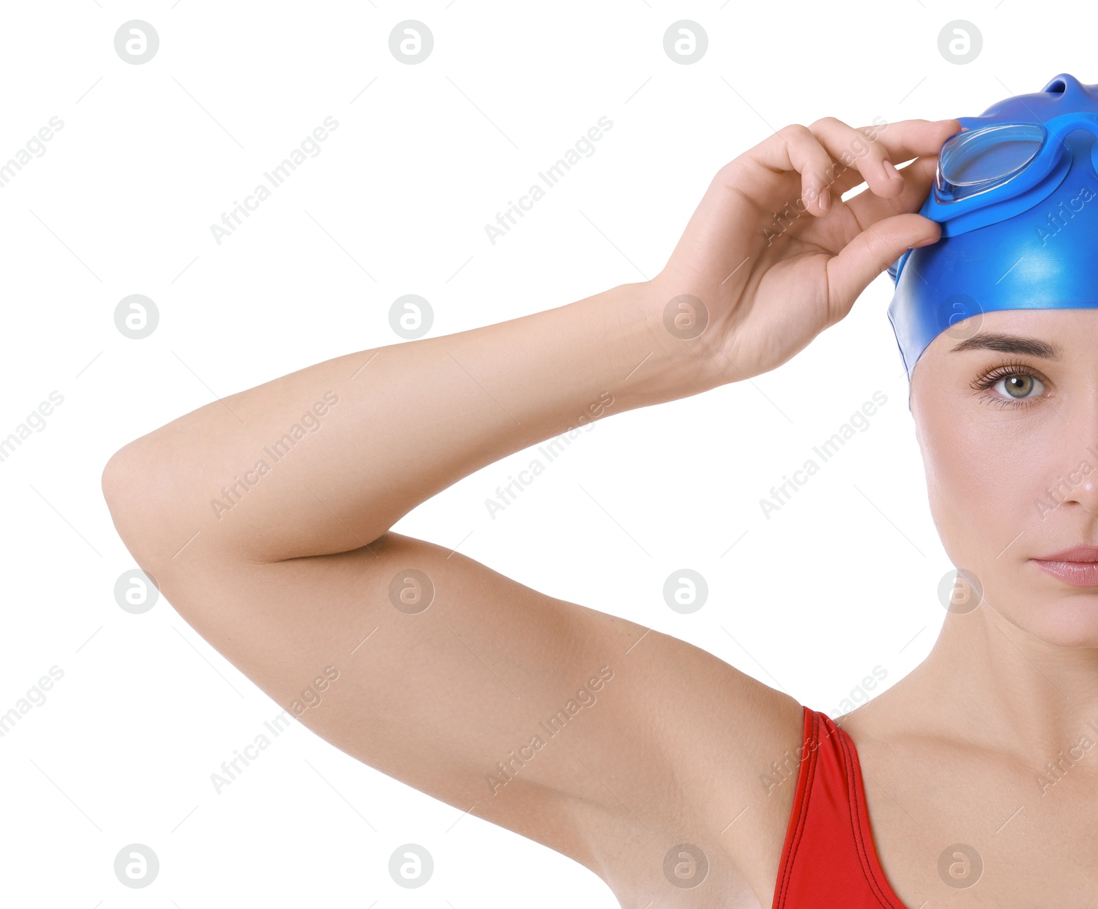 Photo of Professional sportswoman wearing swimming cap and goggles on white background, closeup