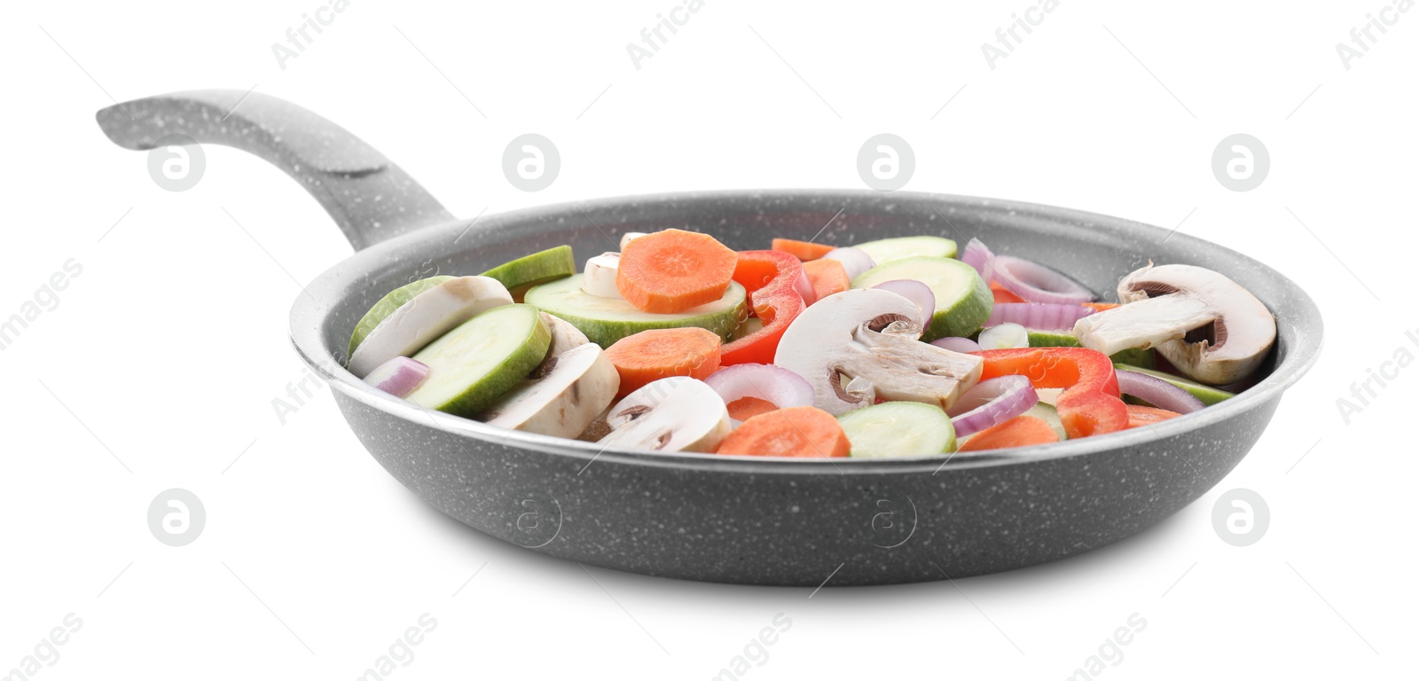 Photo of Frying pan with mix of fresh vegetables and mushrooms isolated on white