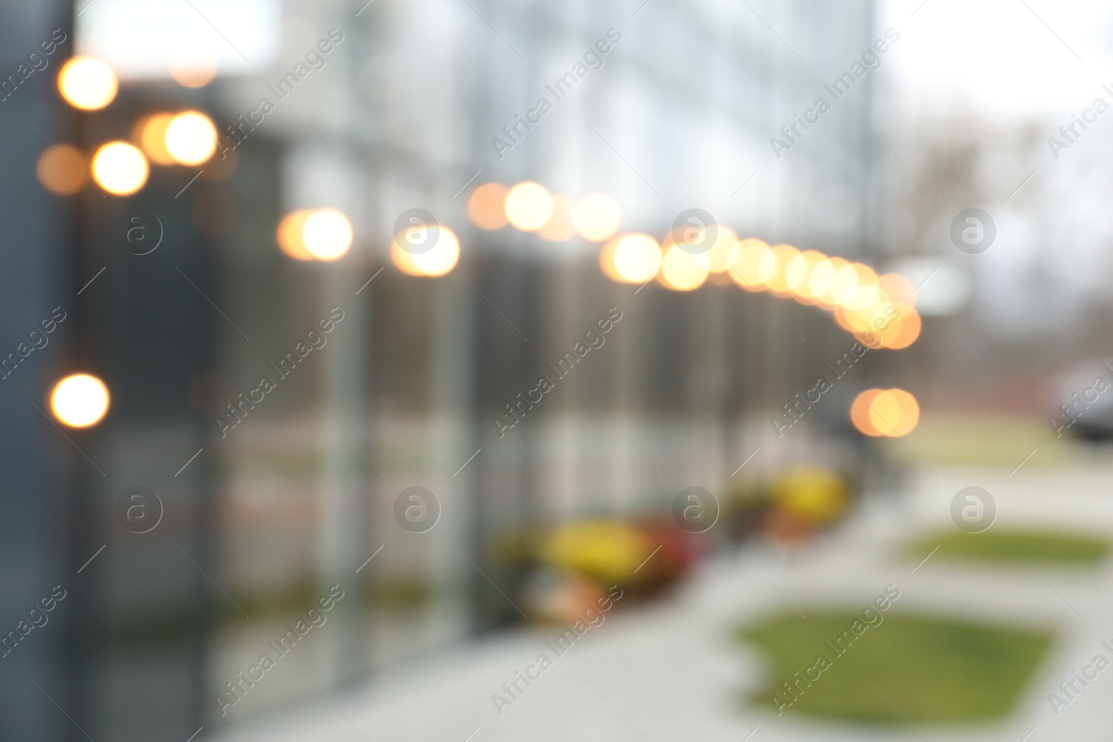 Photo of Blurred view of modern building with many windows outdoors