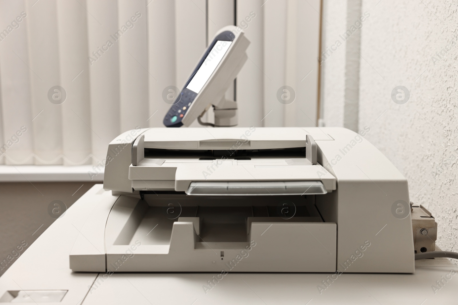 Photo of One modern printer in room, closeup view