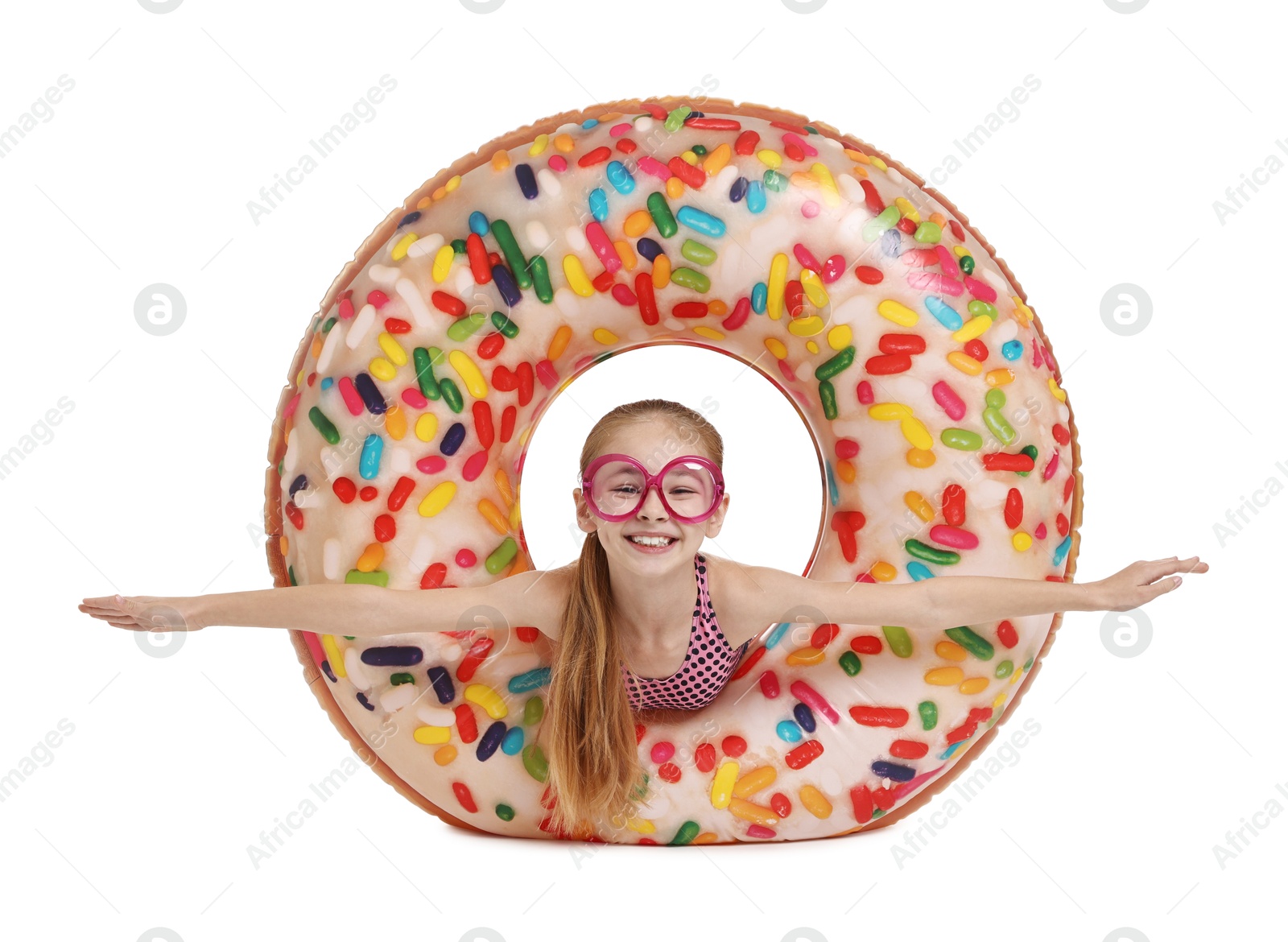 Photo of Happy girl in beachwear with inflatable ring on white background