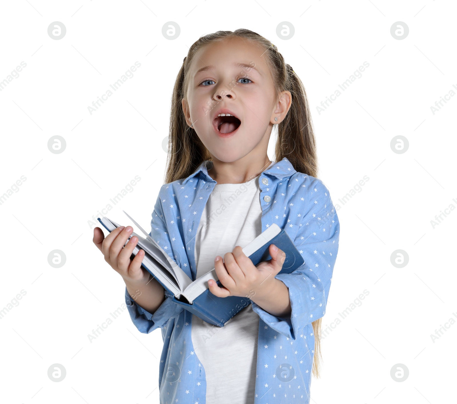 Photo of Learning alphabet. Little girl with book on white background