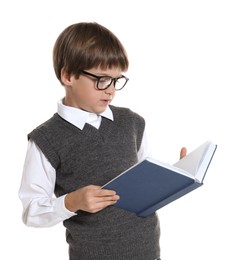 Photo of Learning alphabet. Little boy with book on white background