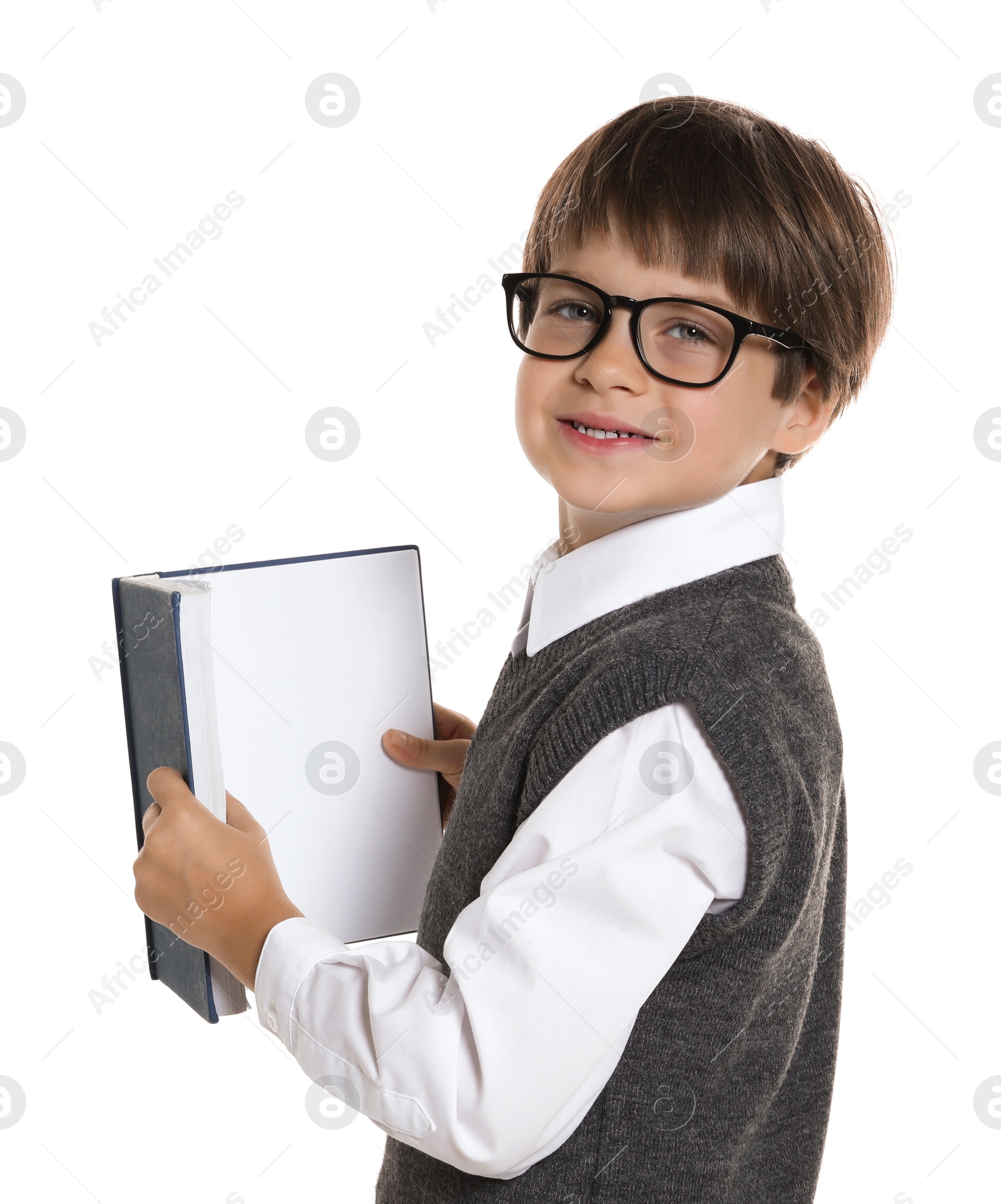 Photo of Learning alphabet. Little boy with book on white background