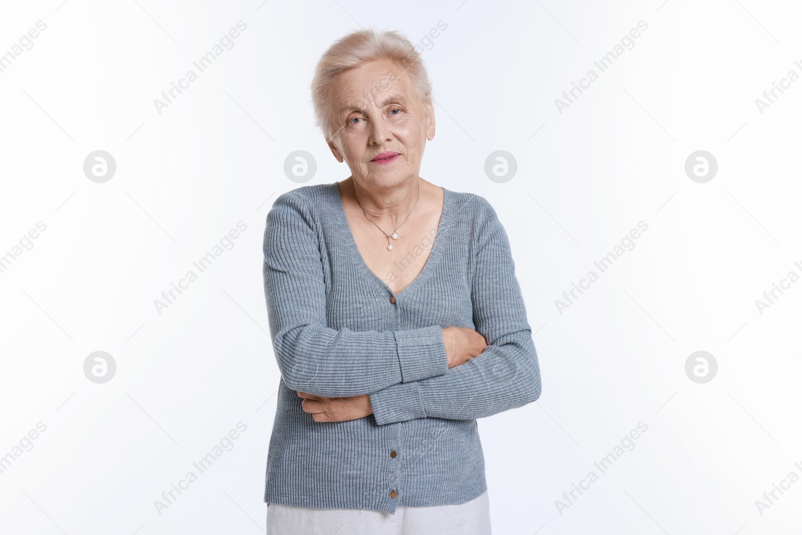 Photo of Portrait of senior woman on white background