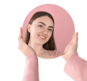 Woman holding round mirror on white background, closeup